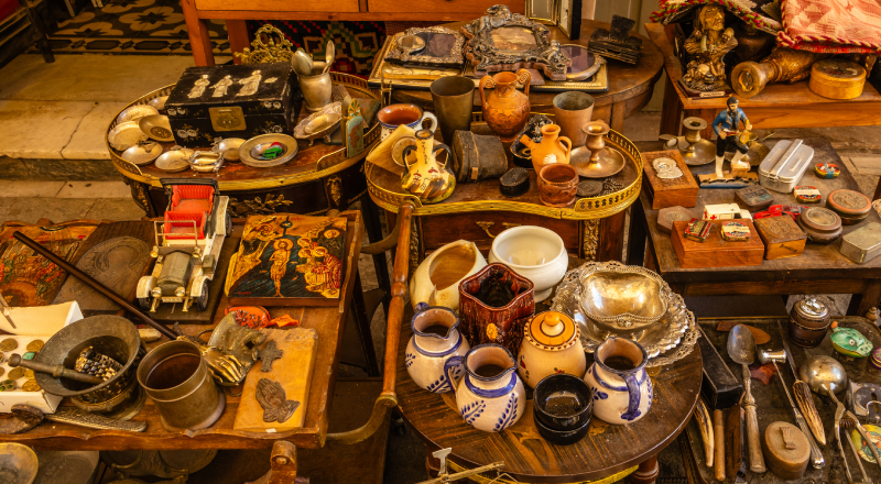 Assortment of antiques, collectibles, vintage décor, and unique household items.